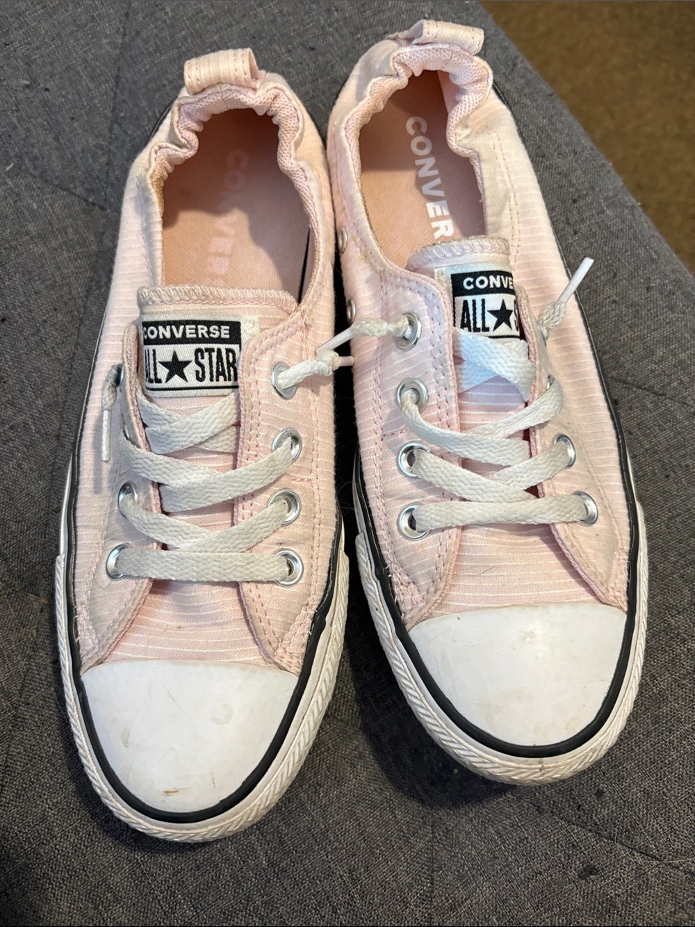 Pink slip on Converse